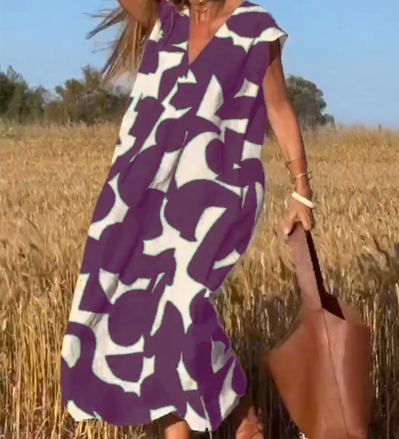 ステファニー™ | Vネックのエレガントで流れるようなプリントドレス