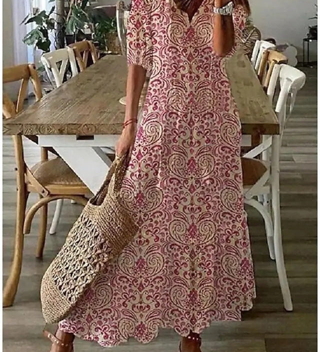 Dúnia™ フラワープリントとフリルのロングドレス